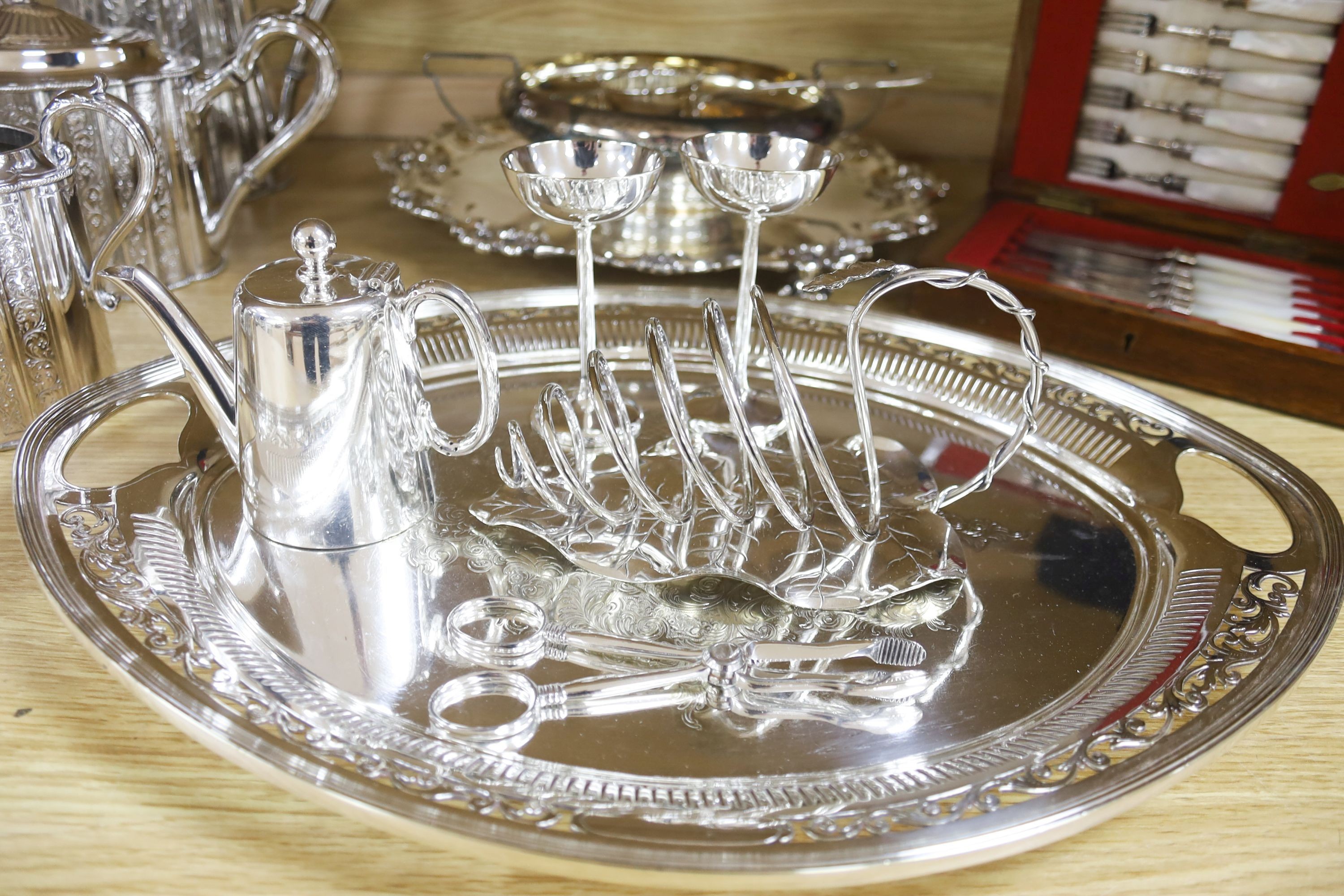 A Victorian cut glass and electroplate biscuit box and other plated wares